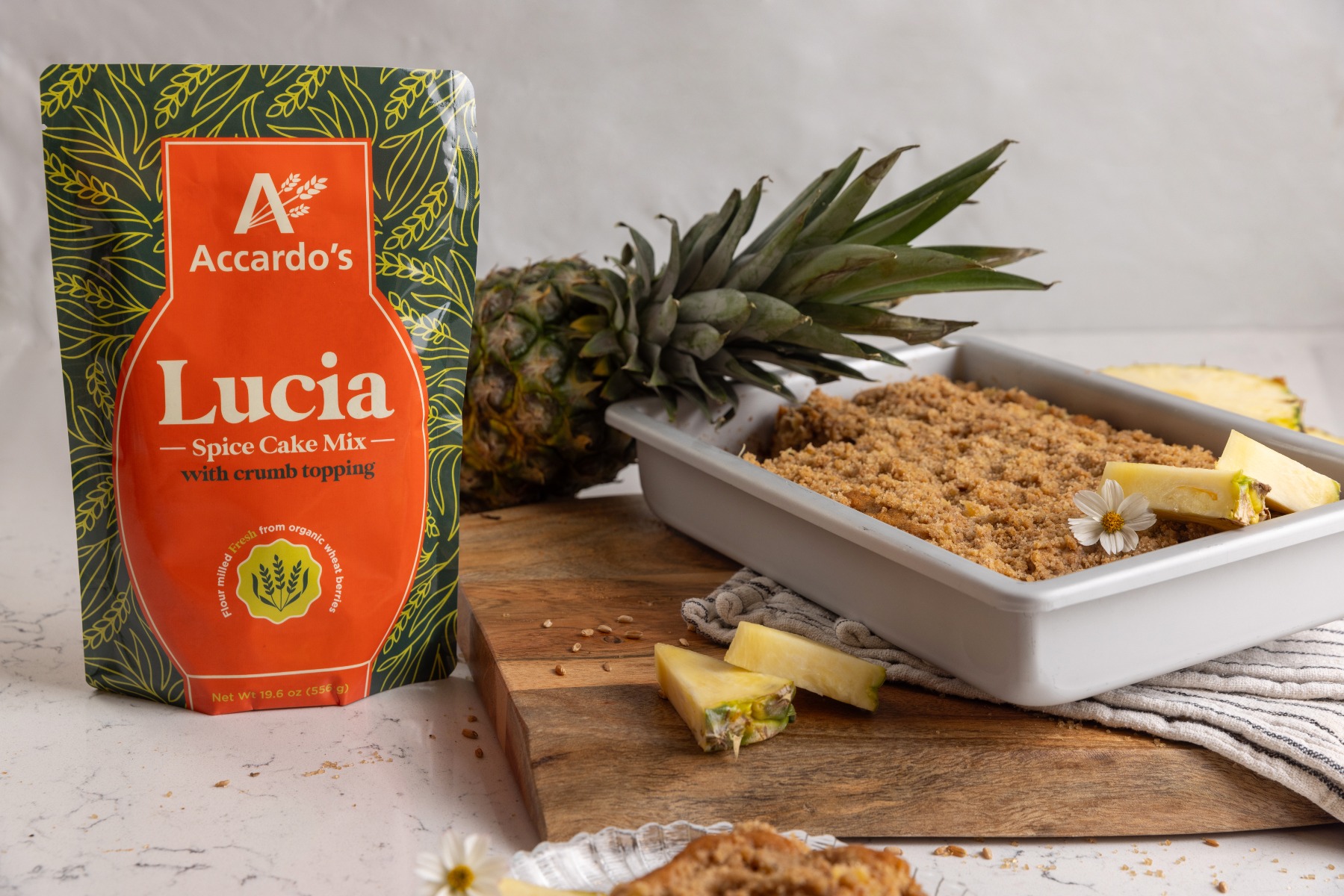 product image of a moist spice cake and the Lucia spice mix bag